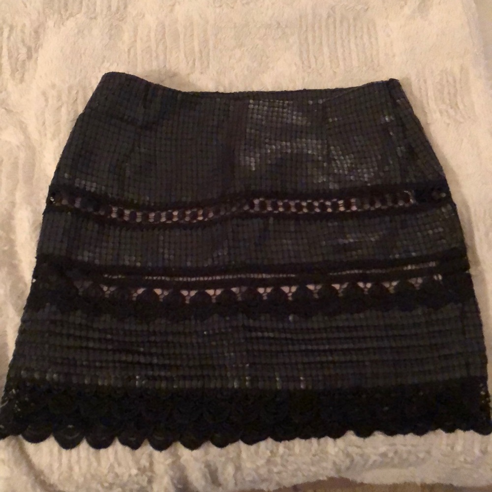 Black TOV Holy mini skirt with nude underlay